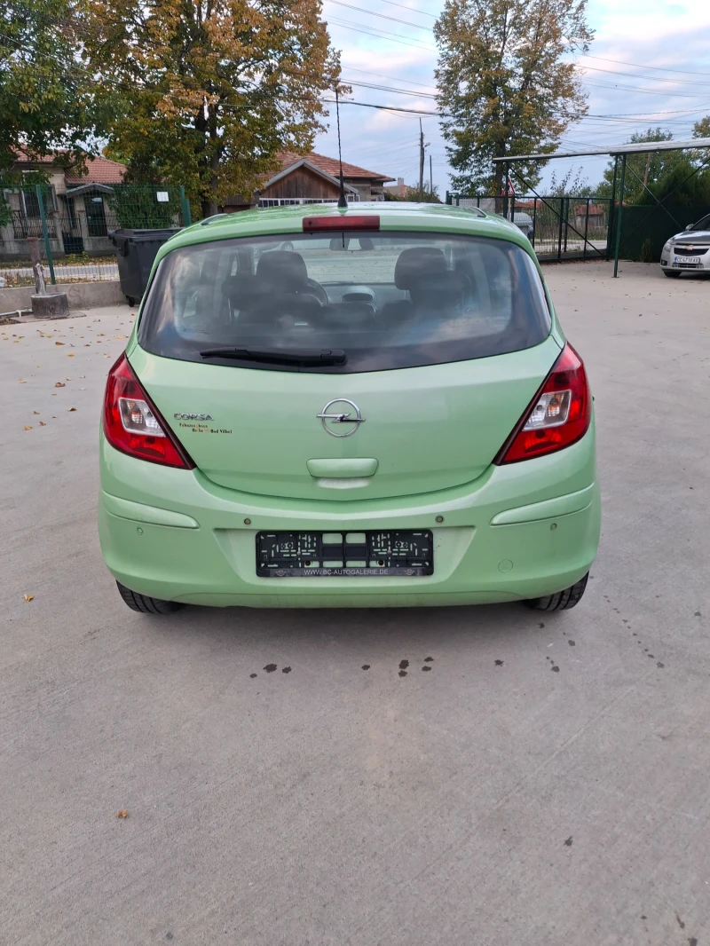 Opel Corsa 1.4 90к.с парктроник, климатик, снимка 9 - Автомобили и джипове - 52555392