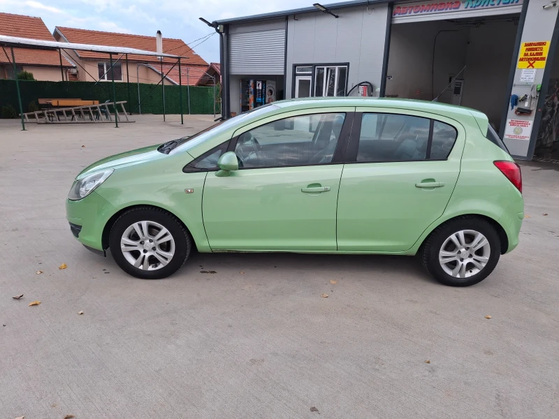 Opel Corsa 1.4 90к.с парктроник, климатик, снимка 8 - Автомобили и джипове - 52555392