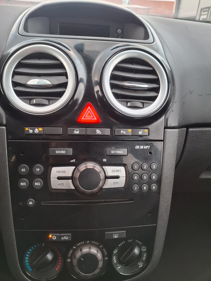 Opel Corsa 1.4 90к.с парктроник, климатик, снимка 15 - Автомобили и джипове - 52555392