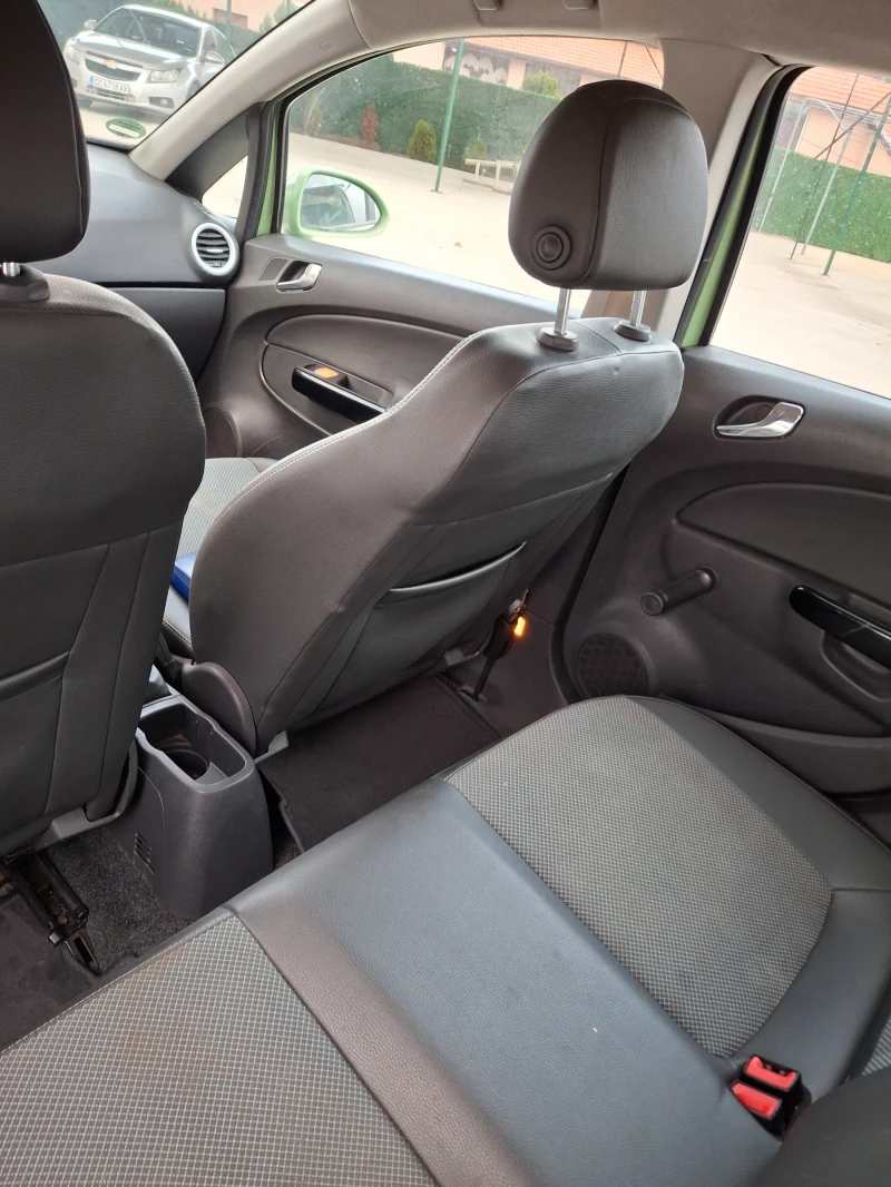 Opel Corsa 1.4 90к.с парктроник, климатик, снимка 12 - Автомобили и джипове - 52555392