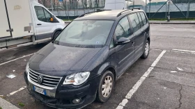 ������ VW Touran