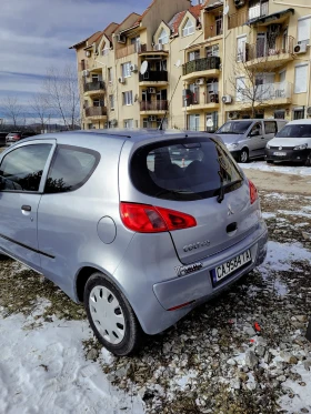 Mitsubishi Colt - 999 € / 1953.87 лв. - 98600435 3