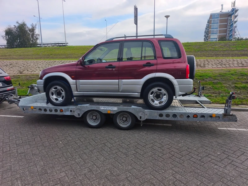 Suzuki Grand vitara 2.0 128к.с., снимка 16 - Автомобили и джипове - 52288662