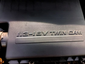 Daihatsu Sirion 1.3 TWIN CAM 16V A/C 4цилиндъра TOYOTA, снимка 14 - Автомобили и джипове - 53684592