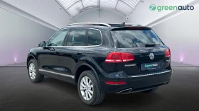     VW Touareg 3.0 TDi 4Motion,    990 .