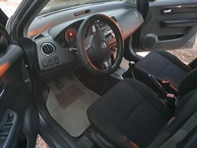Suzuki Swift 1.3i 4x4 ESKLUZIVE , снимка 9