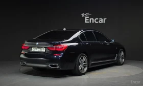BMW 740 XDRIVE* M SPORT* HEADUP* 360* DIGITAL* PANO* ОБДУХ, снимка 2