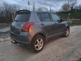 Suzuki Swift 1.3i 4x4 ESKLUZIVE  - 1499 € / 2931.79 лв. - 38648323 7