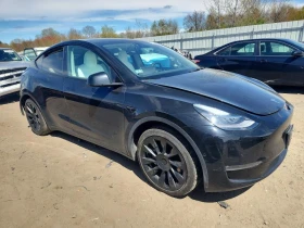 Tesla Model Y - 15500 € / 30315.36 лв. - 10707642 4