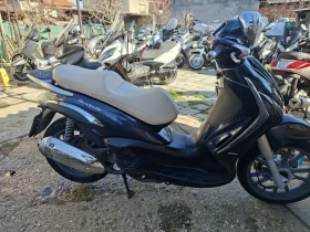 Piaggio Beverly 300ie tourer, снимка 11 - Мотоциклети и мототехника - 53647684