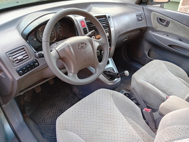 Hyundai Tucson 2.0 CRDI, снимка 9 - Автомобили и джипове - 45769839