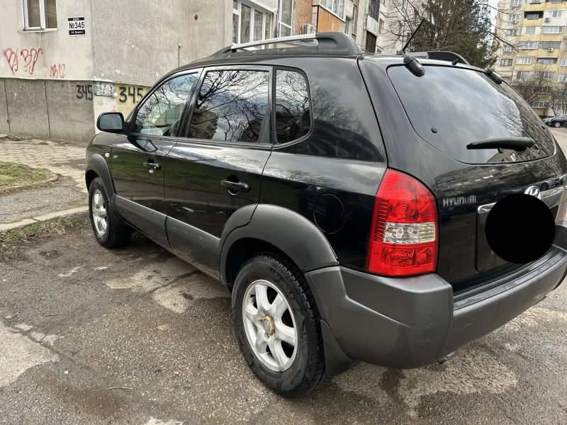 Hyundai Tucson 2.0 CRDI, снимка 6 - Автомобили и джипове - 53097705