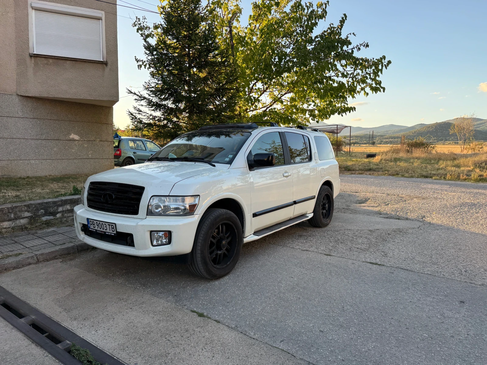 Infiniti QX56, снимка 8 - Автомобили и джипове - 56273015