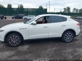 Maserati Levante 8ZF* Keyless* Подгреви* Червен салон* Клип на мото - 15500 € / 30315.36 лв. - 55516502 7
