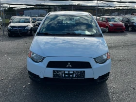 Mitsubishi Colt 1.1i Climate Facelift - 5590 лв. / 2858.12 € - 79876478 8
