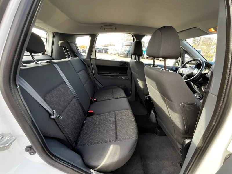 Mitsubishi Colt 1.1i Climate Facelift, снимка 11 - Автомобили и джипове - 52614280