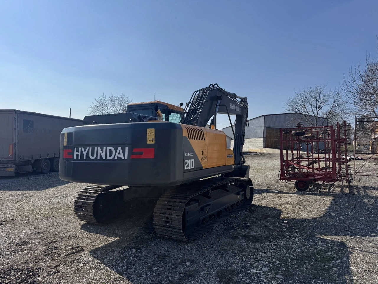 Багер Hyundai R210