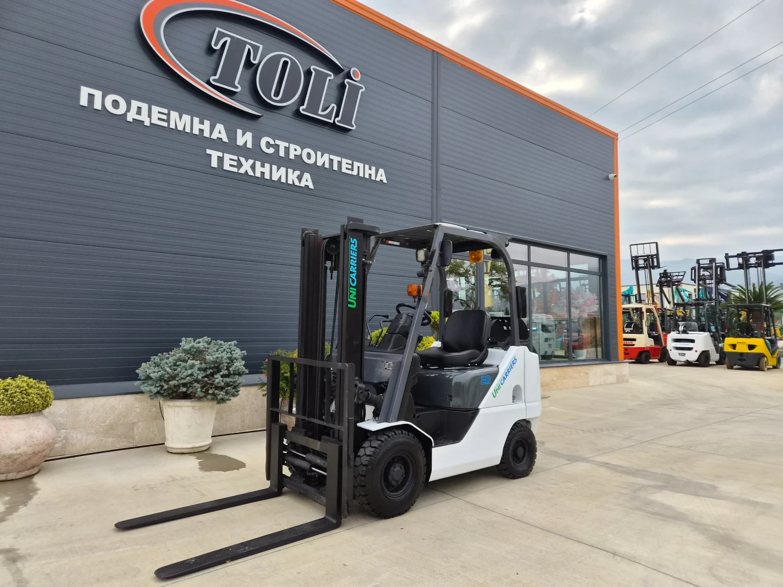 Мотокар Nissan UNICARRIERS / 2 тона / ИЗРАВНИТЕЛ / ГАЗ+ БЕНЗИН !