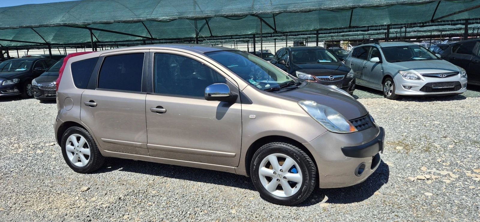 Nissan Note 1.4, снимка 9 - Автомобили и джипове - 54571433
