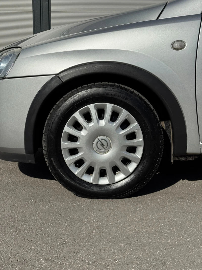 Opel Corsa C 1.2i Facelift, снимка 8 - Автомобили и джипове - 53295591