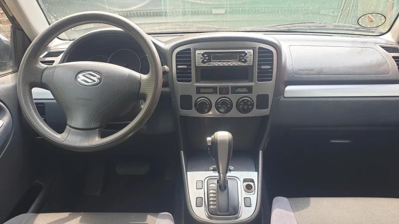 Suzuki Grand vitara 2.0i, снимка 5 - Автомобили и джипове - 51035340