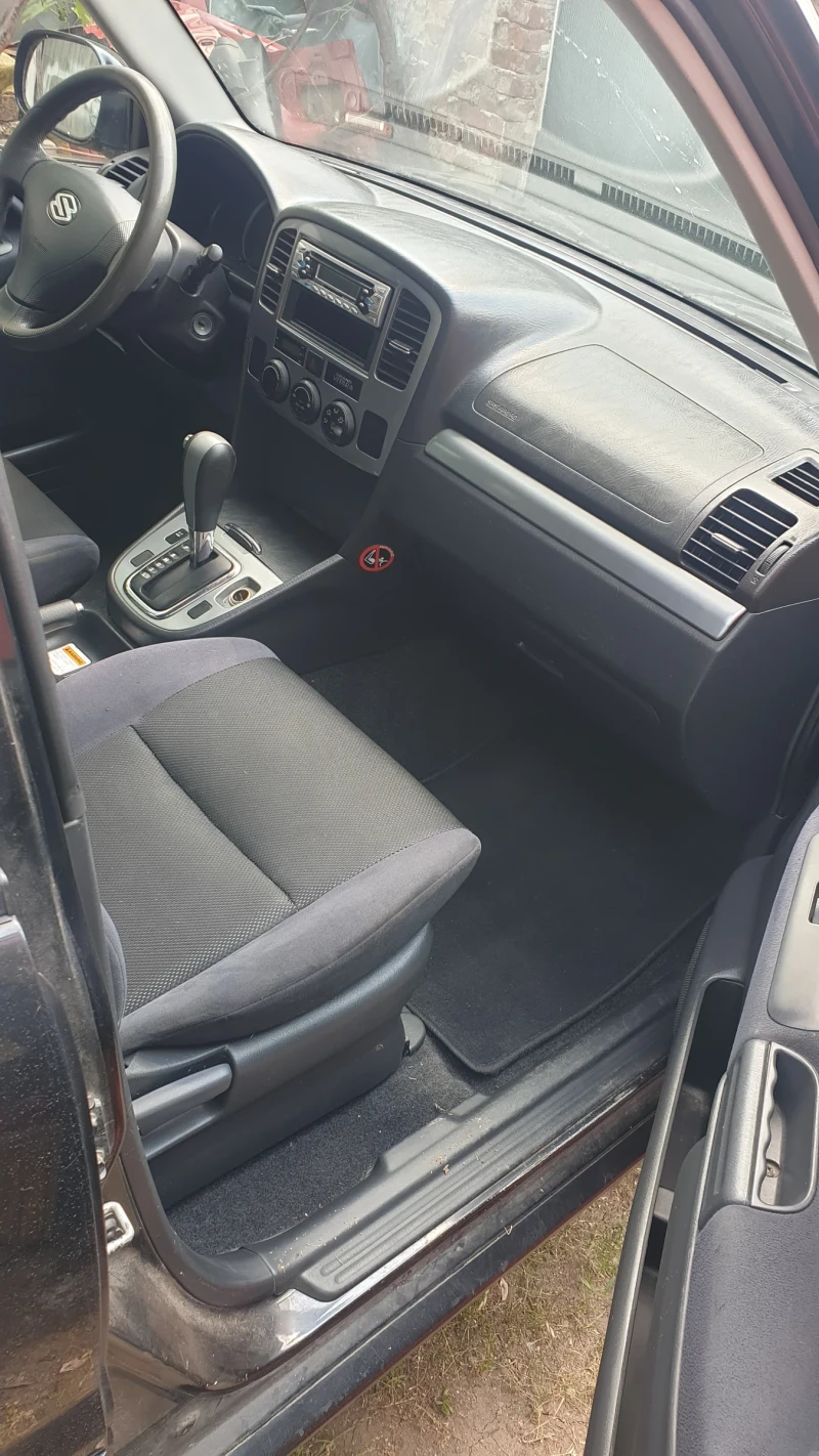 Suzuki Grand vitara 2.0i, снимка 7 - Автомобили и джипове - 51035340