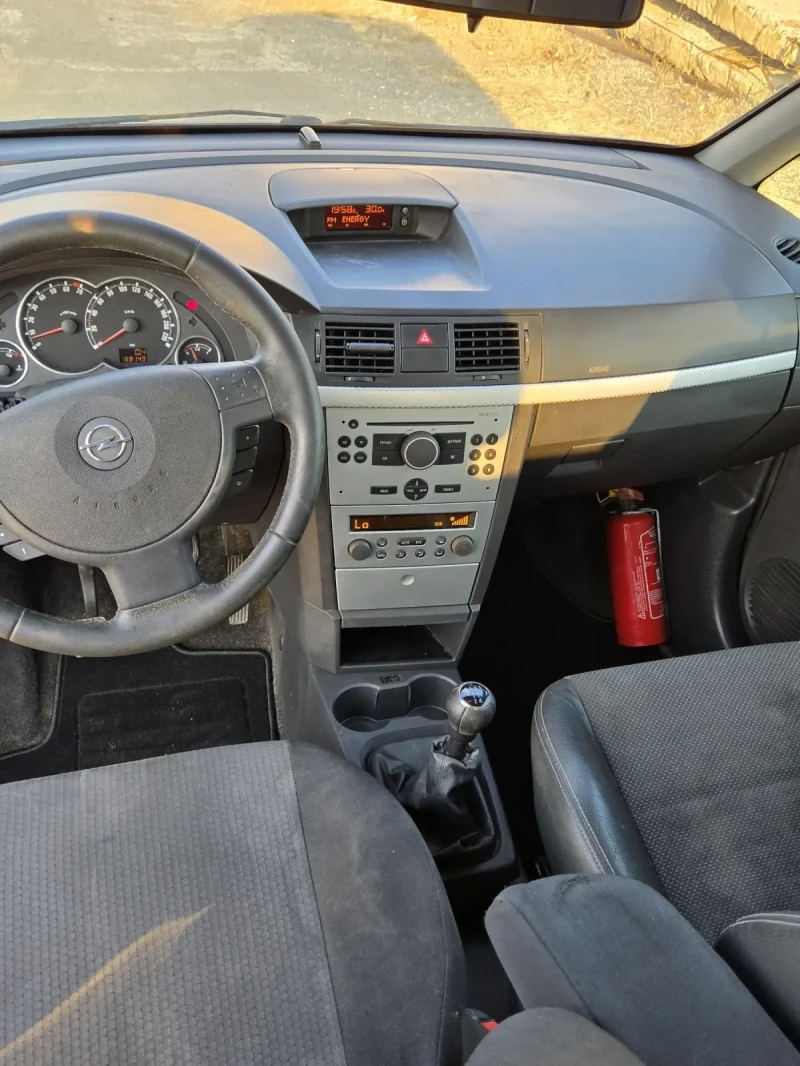 Opel Meriva 1.4i 16V, снимка 9 - Автомобили и джипове - 52475358