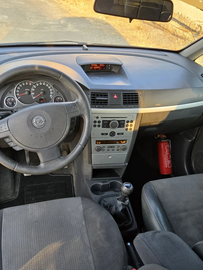 Opel Meriva 1.4i 16V, снимка 10 - Автомобили и джипове - 52475358
