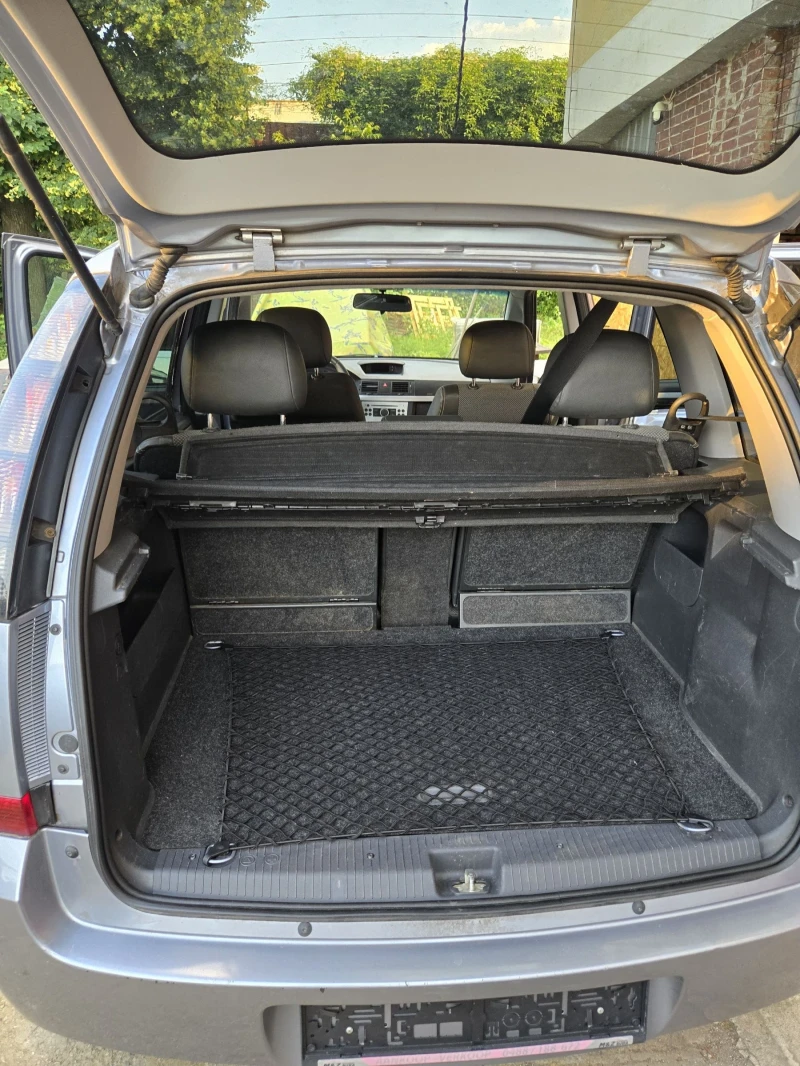 Opel Meriva 1.4i 16V, снимка 14 - Автомобили и джипове - 52475358