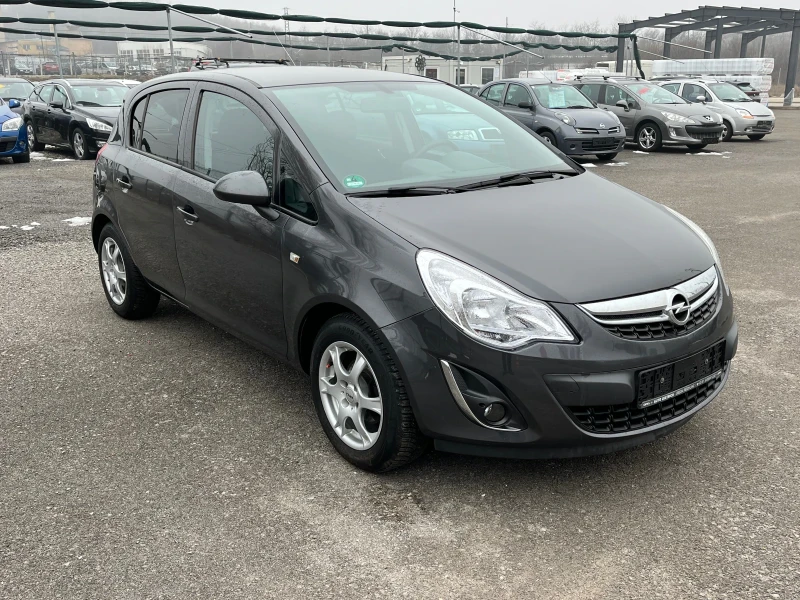 Opel Corsa 1.4i Facelift , снимка 7 - Автомобили и джипове - 49287771