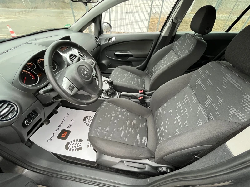 Opel Corsa 1.4i Facelift , снимка 9 - Автомобили и джипове - 49287771