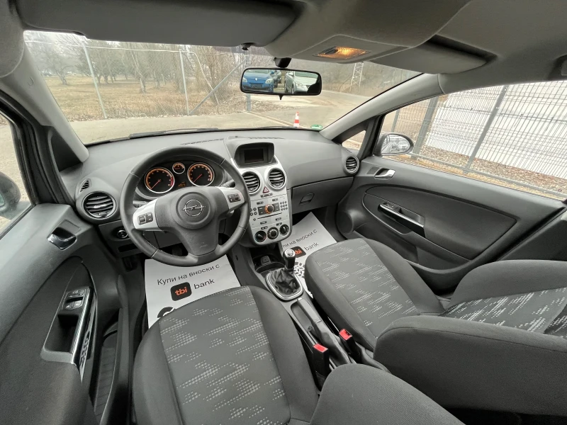 Opel Corsa 1.4i Facelift , снимка 13 - Автомобили и джипове - 49287771