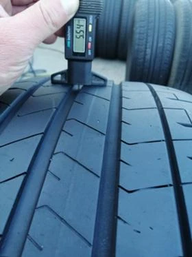 Гуми Летни 265/35R21, снимка 7