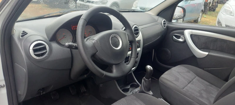 Dacia Logan 1.5 dci клима, снимка 7 - Автомобили и джипове - 47239330