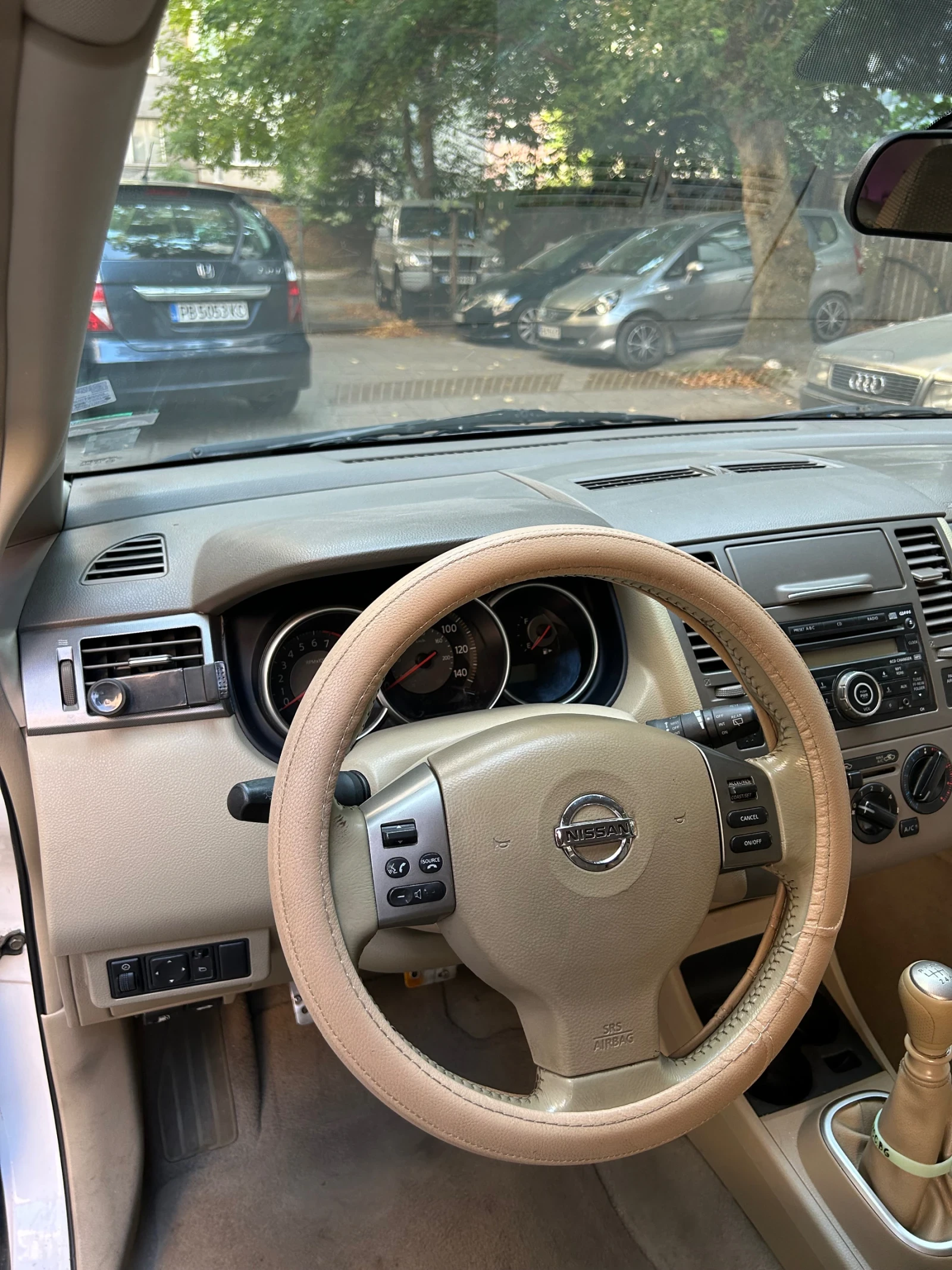 Nissan Tiida  - изображение 9