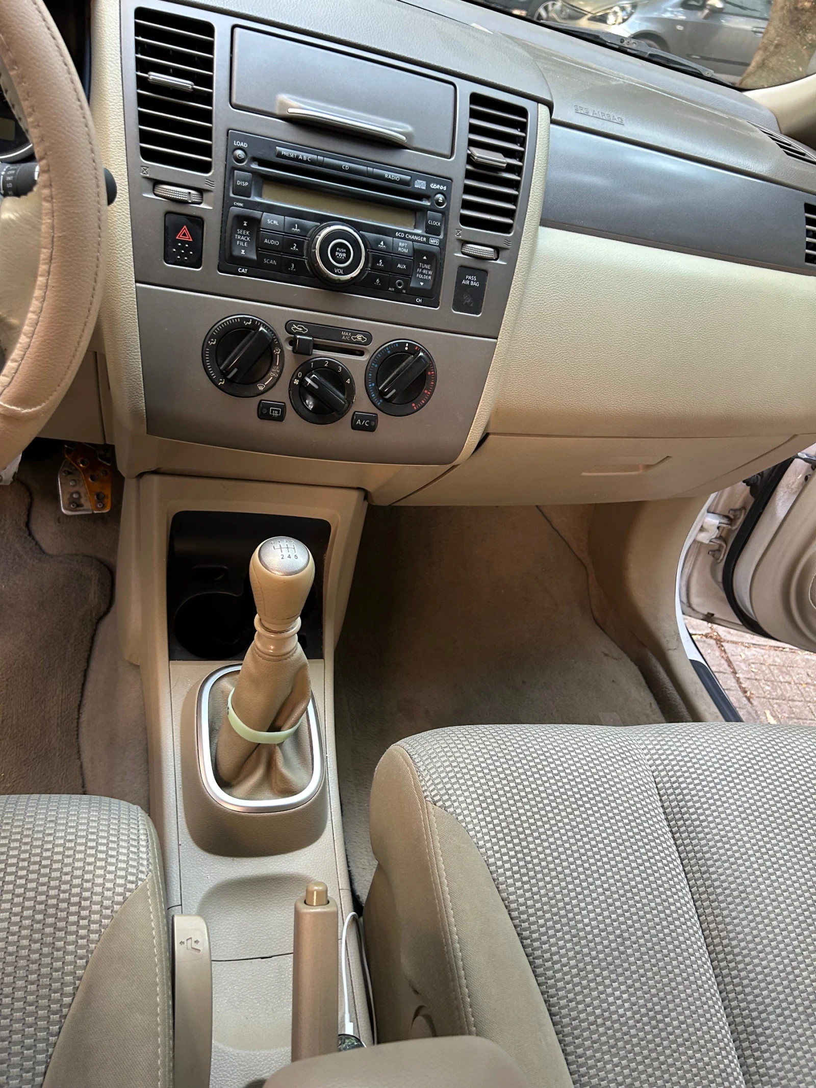 Nissan Tiida  - изображение 10