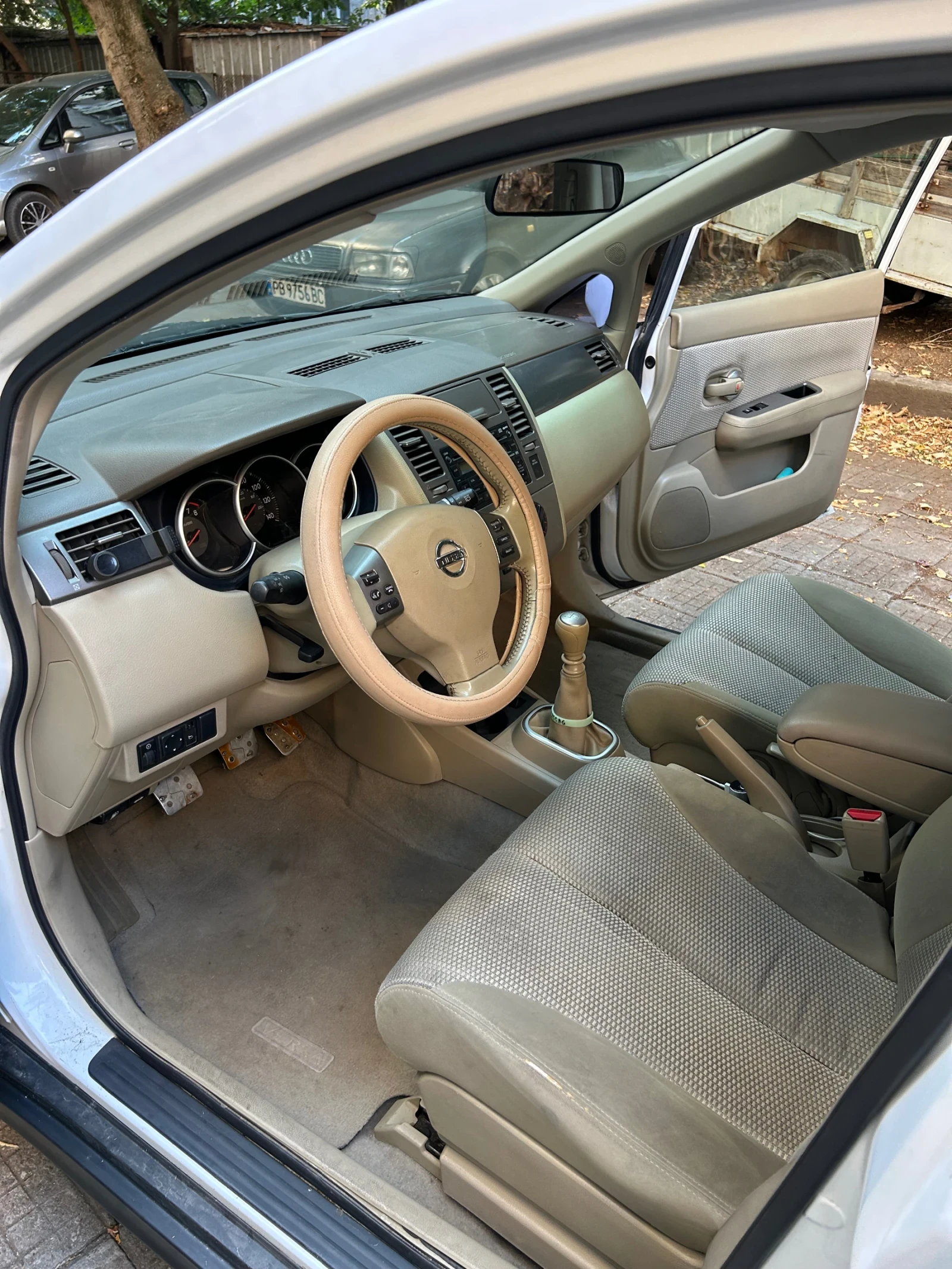 Nissan Tiida  - изображение 8