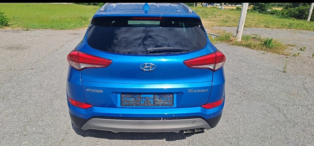 Hyundai Tucson 1.6i 16v, снимка 9 - Автомобили и джипове - 55006542