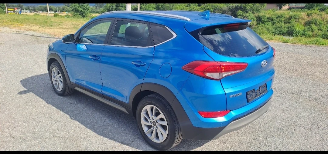 Hyundai Tucson 1.6i 16v, снимка 10 - Автомобили и джипове - 55006542