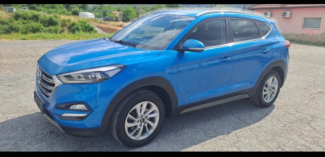 Hyundai Tucson 1.6i 16v, снимка 5 - Автомобили и джипове - 55006542