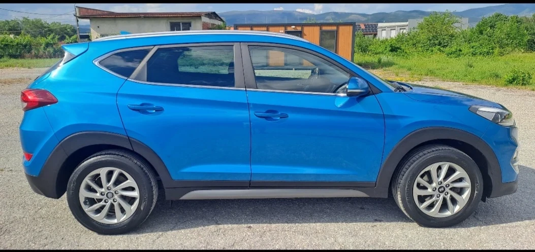 Hyundai Tucson 1.6i 16v, снимка 7 - Автомобили и джипове - 55006542