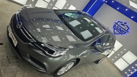 Opel Astra SPORTS TOURER, снимка 1 - Автомобили и джипове - 44478366