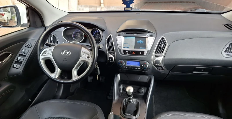 Hyundai IX35 1.6 Газ-бензин-нави-кожа-камера., снимка 11 - Автомобили и джипове - 53127016