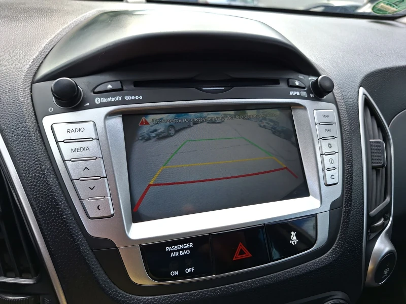 Hyundai IX35 1.6 Газ-бензин-нави-кожа-камера., снимка 12 - Автомобили и джипове - 53127016