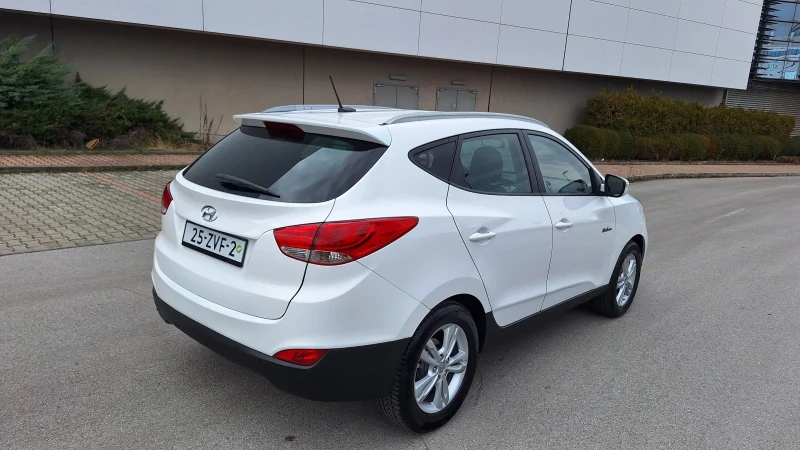 Hyundai IX35 1.6 Газ-бензин-нави-кожа-камера., снимка 4 - Автомобили и джипове - 53127016