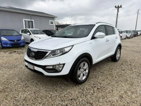 Kia Sportage 2.0i Swiss 4x4, снимка 2