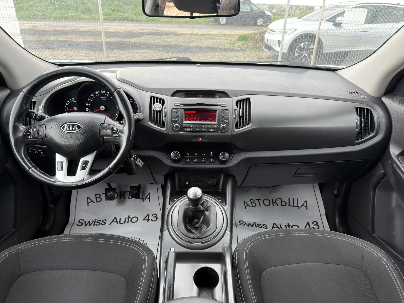 Kia Sportage 2.0i Swiss 4x4, снимка 10 - Автомобили и джипове - 54156384