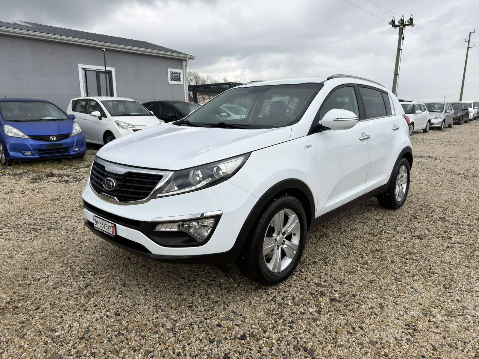Kia Sportage 2.0i Swiss 4x4, снимка 2 - Автомобили и джипове - 54156384