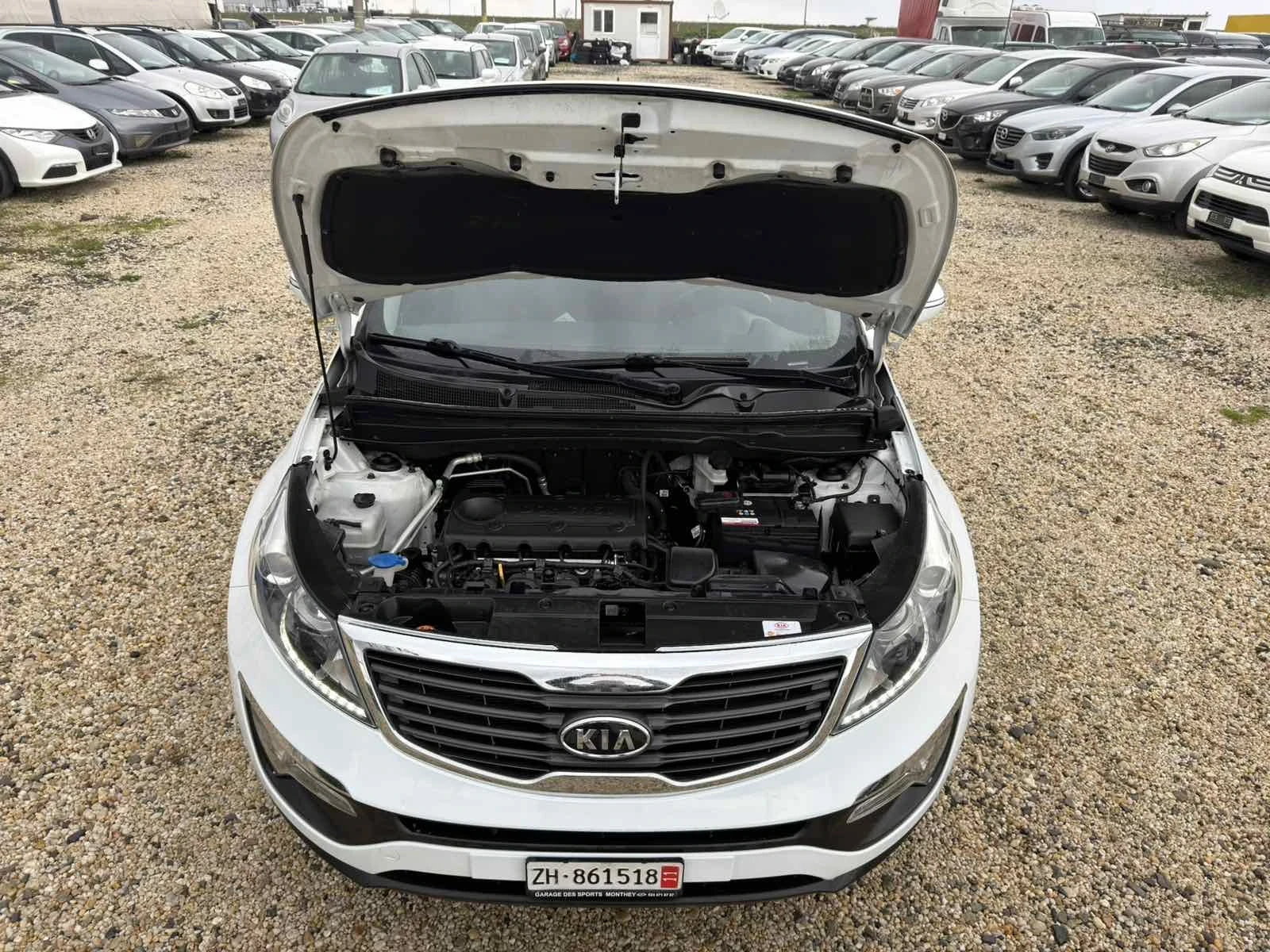 Kia Sportage 2.0i Swiss 4x4, снимка 4 - Автомобили и джипове - 54156384