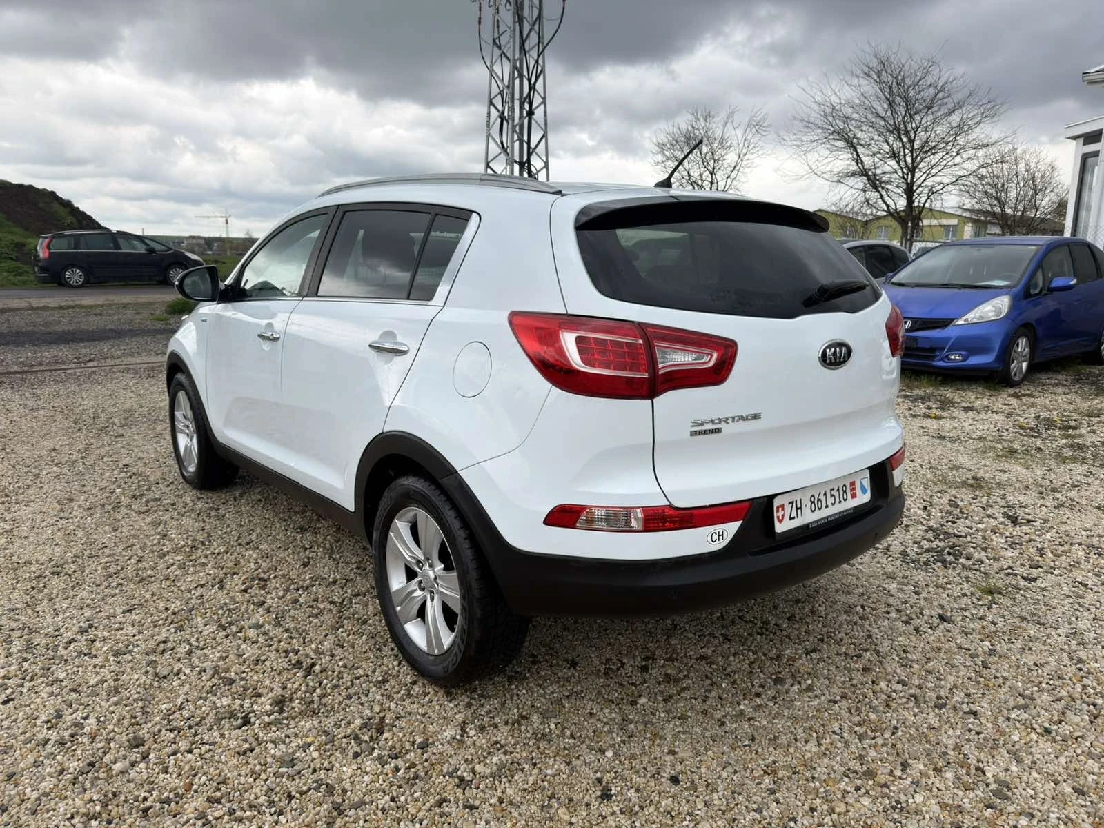 Kia Sportage 2.0i Swiss 4x4, снимка 6 - Автомобили и джипове - 54156384